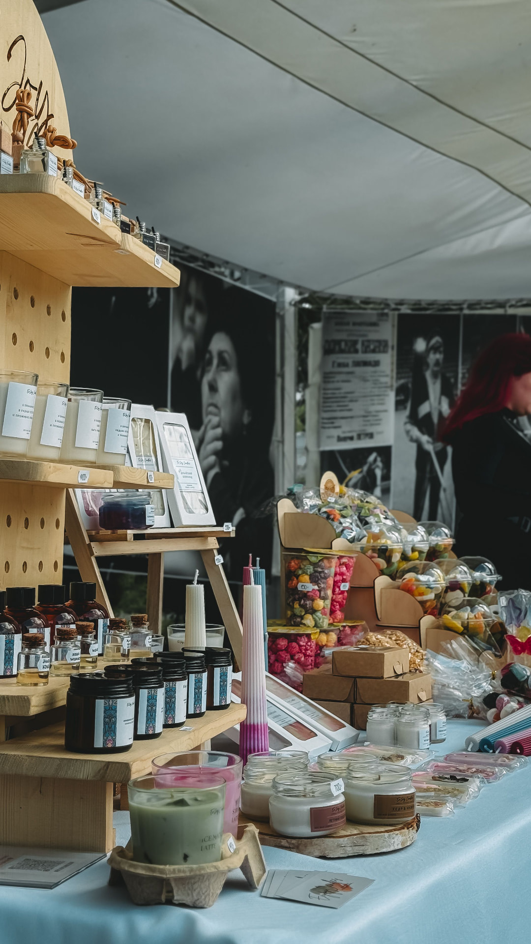 Handmade candles and skincare on a market stall display